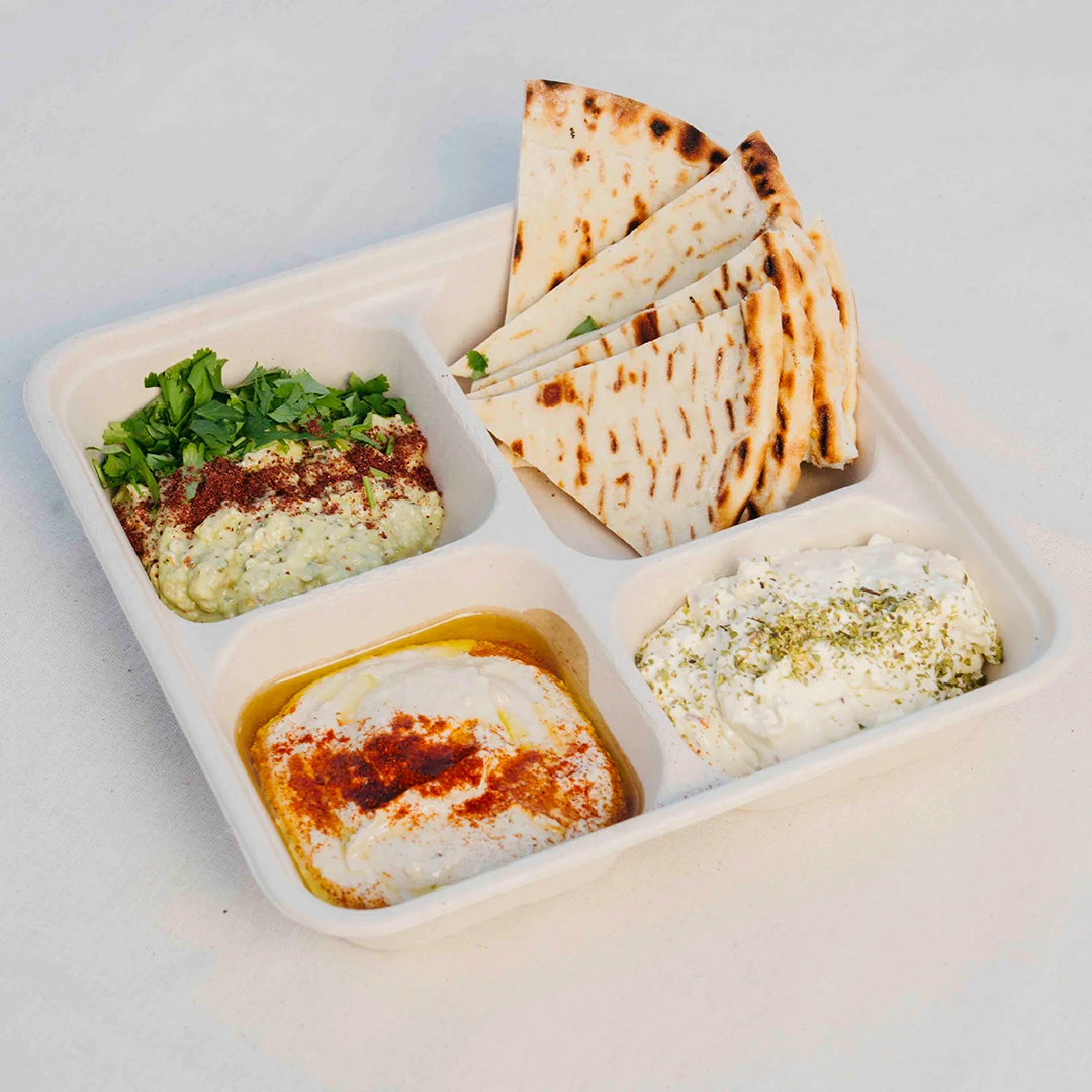 Athena homemade dips with warmed pita bread